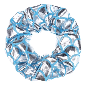 Detail view of silver and light blue fish scale pattern scrunchie with metallic shine