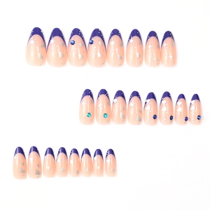 24pcs long almond press-on nails with blue French tips, glitter stars and heart rhinestones