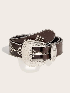 Detail of dark brown faux crocodile leather belt with vintage silver rhinestone buckle