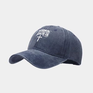 Detail of vintage washed navy cotton baseball cap with Jesus religious print