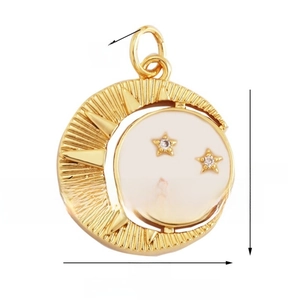 Detail of 17mm gold moon pendant with white enamel center and three star-cut zircons