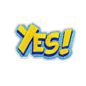 Funny YES! embroidered alphabet patch in yellow and blue with professional stitch texture