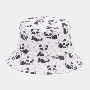 Close-up of white bucket hat featuring cute panda patterns and detailed reinforced stitching