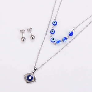 Detailed view of silver stainless steel jewelry set with blue evil eye pendant and studs