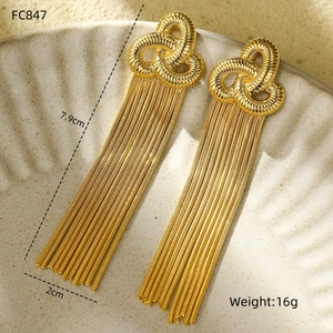 Elegant gold starfish fringe tassel earrings featuring triple-loop spiral knot design