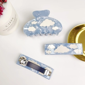 Blue sky cloud pattern hair claw and clip set in acrylic with a dreamy aesthetic