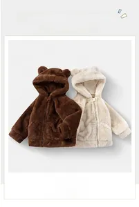 Detail of plush fleece kids hoodies with bear ears and warm ribbed cuffs in two colors