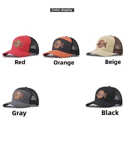 Detail view of five mesh fishing caps with round leather logo patches in multiple colors