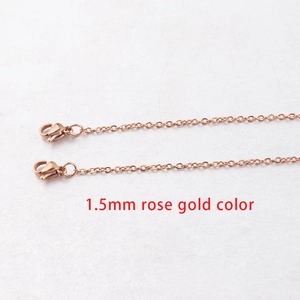 Detail view of 1.5mm rose gold stainless steel link chain with secure lobster clasp