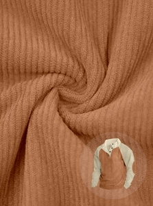 Close-up of brown striped corduroy texture on men's long sleeve outdoor henley shirt