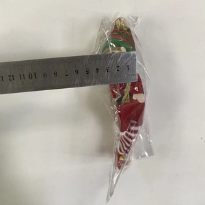 Detailed measurement showing the 5.5cm width of the Christmas elf doll pendant