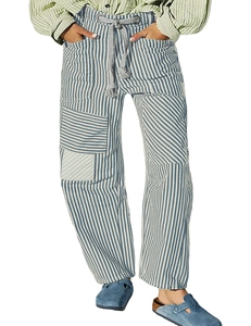 Detail of blue and white striped trousers featuring elastic drawstring waist and side pockets