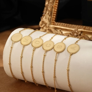 Elegant gold S925 silver beaded chain bracelet with minimalist initial letter charms