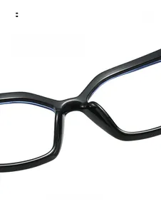Close-up of integrated comfortable nose pads on black glossy eyeglass frames