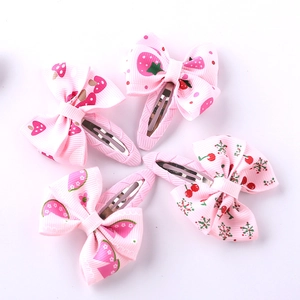 Pink ribbon bow hair clips with strawberry and cherry patterns for girls, set of 4