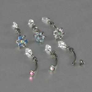 G23 titanium curved barbell navel rings with flower charms and opal stone inlays