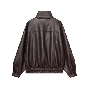 Detail view of the back of this vintage dark brown PU leather jacket showing texture