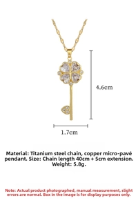 Detail of flower key necklace with zircon clover design and dimensions on white background