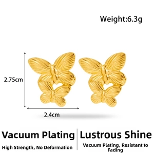 Detail view of gold butterfly earrings with dimensions 2.75cm and weight 6.3g