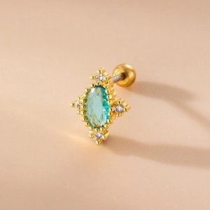 Gold stainless steel stud earring featuring green oval stone and clear crystal accents