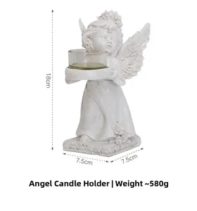 Detailed view of white angel resin candle holder with height and base dimension labels
