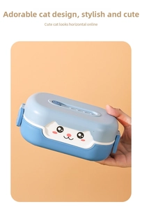 Detail of blue and white cat-themed lunch box featuring secure side buckles and air vent