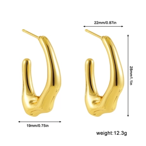 Detail view of gold C-shaped teardrop earrings with dimensions 28mm by 22mm