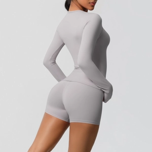 Rear view of a light purple tight yoga set showing high elasticity and shaping fabric