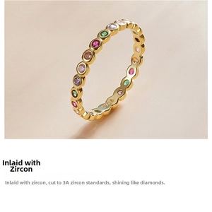Macro shot of S925 silver gold-plated ring featuring colorful inlaid zircon stones