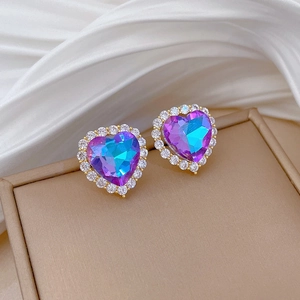 Golden heart stud earrings with purple gradient crystal and diamond pavé surround