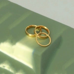 Three-piece minimalist 18K gold-plated titanium steel rings in various band widths