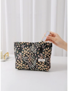 Floral embroidered cosmetic bag with high capacity and black fabric for travel storage