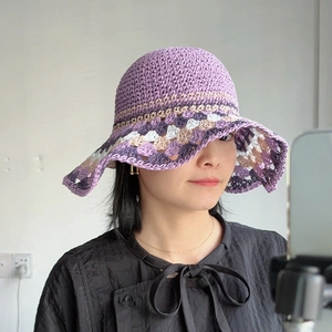 Handmade crochet sun hat with wide brim in purple bohemian style for beach travel