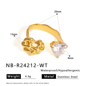 Macro view of gold stainless steel ring with heart zircon and size dimensions
