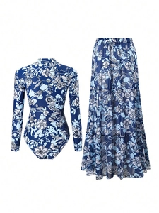 Detail of navy blue floral long sleeve swimsuit set with matching maxi beach skirt
