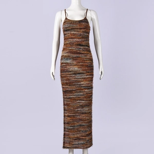 Detail of multi-color knit dress showing side slit and fuzzy textured stripe fabric