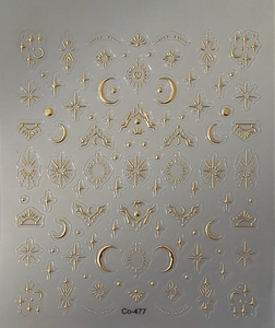 Detailed sheet of gold 3D embossed nail art stickers with sun, moon, and star patterns