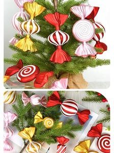 Macro view of colorful spiral candy Christmas ornaments with glossy finish and hanging loops