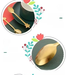 Detail of golden stainless steel spoon featuring a star handle and matte brushed finish