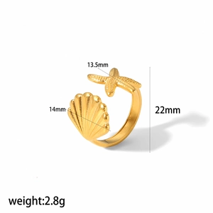 Detailed dimension guide for golden starfish and shell ring showing size and weight specs