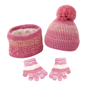 Kids winter set with gradient pink knit hat, pompom, fleece scarf and warm gloves