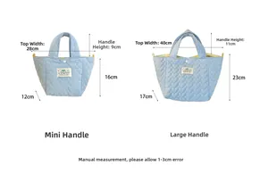 Detailed size comparison of light blue quilted heart tote bag in mini and large versions