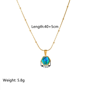 Minimalist gold hexagon necklace featuring abalone shell pendant on titanium steel chain