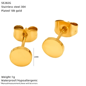 Detail view of 6mm round 18k gold plated 304 stainless steel hypoallergenic stud earrings