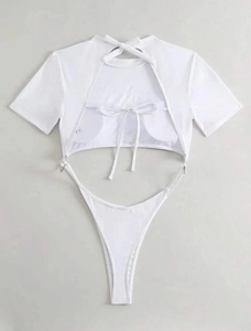Detailed flat lay of white short-sleeve bikini set with hollow back tie-up design