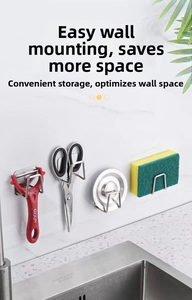 Detail of stainless steel wall hook showing strong adhesive backing on marble tiles
