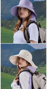 Detail of wide brim sun hat with neck protection and ponytail hole in soft outdoor lighting