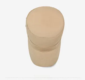 Bird's eye view of a beige flat top military cap with parallel stitching details