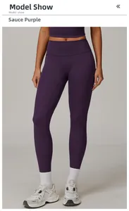 Detail view of high waist yoga leggings in deep purple on a model with white socks