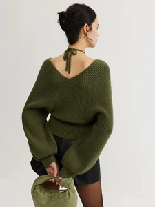 Olive green backless knit sweater with halter neck and puff sleeves for a stylish look